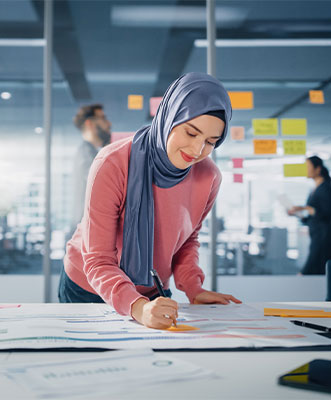 Female Engineer working at desk
